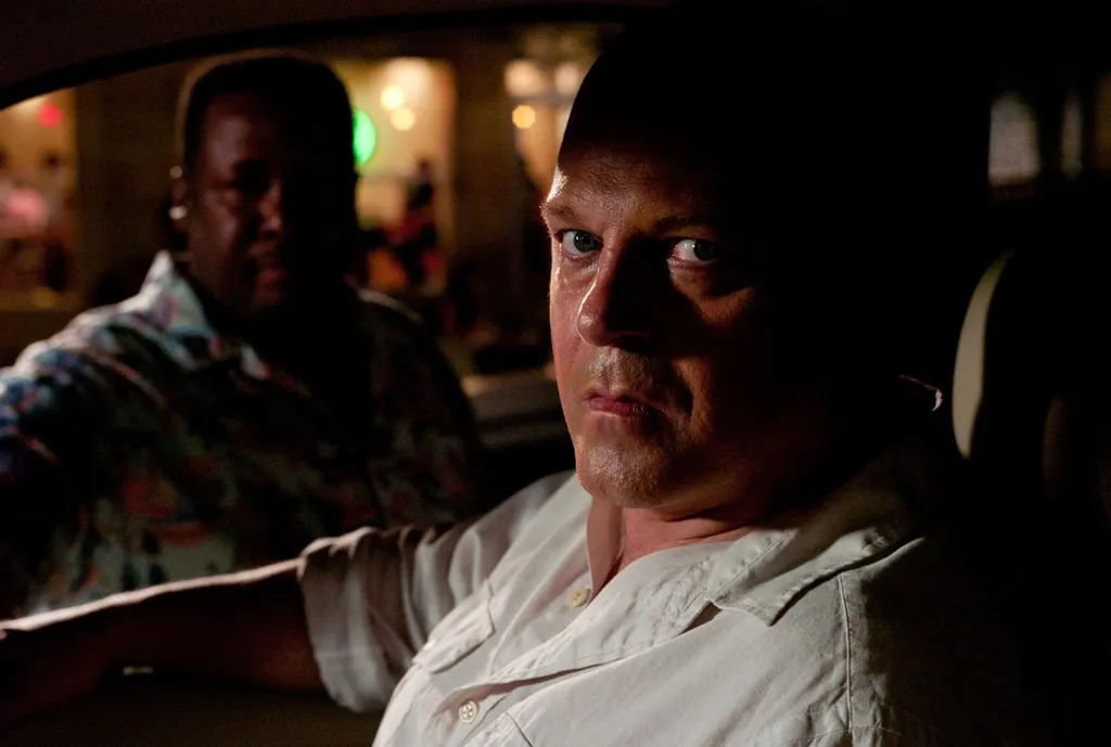 Melander (Michael Chiklis)